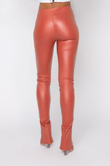 FULL OF SECRETS VEGAN LEATHER TROUSER